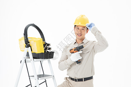 维修工人梯子工具箱拿着转钻抢图片素材