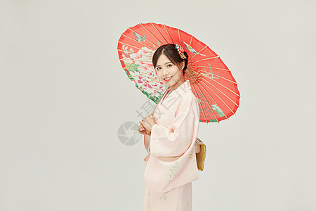 日本可爱美少女和服美女手撑油纸伞背景