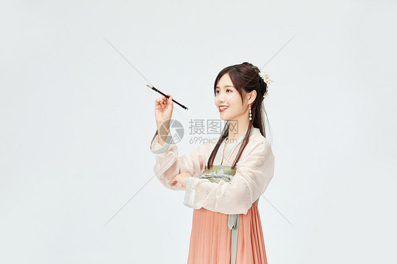 汉服美女手拿毛笔图片