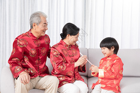 红色 家庭 人物孩子给长辈拜年背景
