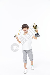 羽毛球运动员羽毛球少年手拿奖杯背景