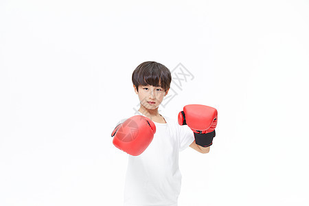 男孩子戴着拳击手套 背景图片