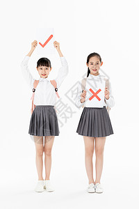 中国图标中学生手举对错图标牌背景