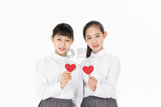 青少年女生手拿爱心图片