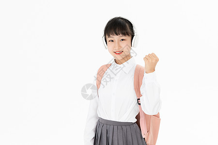 中学生女孩握拳加油背景图片