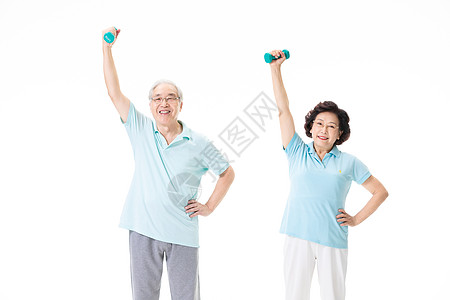 老人夫妇老年夫妇用哑铃锻炼背景
