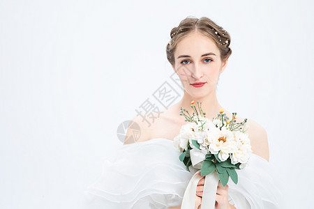 外国美女彩妆外国优雅女性拿着花背景