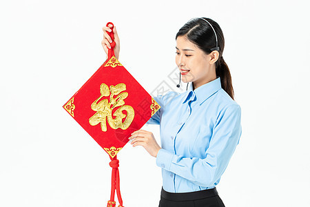 商务客服拿福字过新年图片