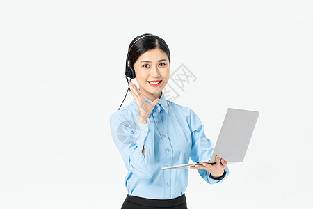 商务女性拿笔记本电脑背景图片