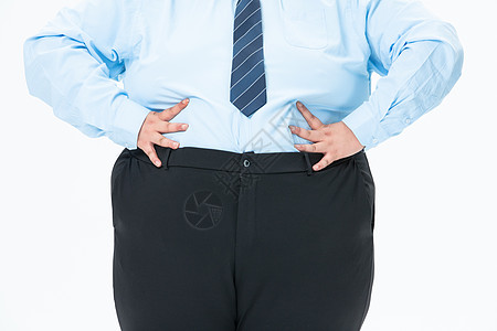 肥胖男性肥胖商务男性摸着肚子背景