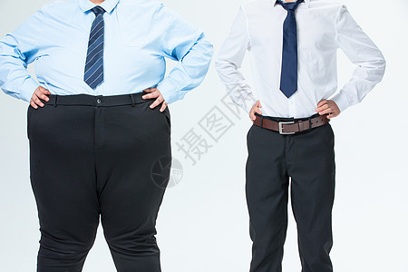 肥胖商务男性比肚子图片