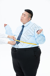 肥胖商务男性量腰围图片
