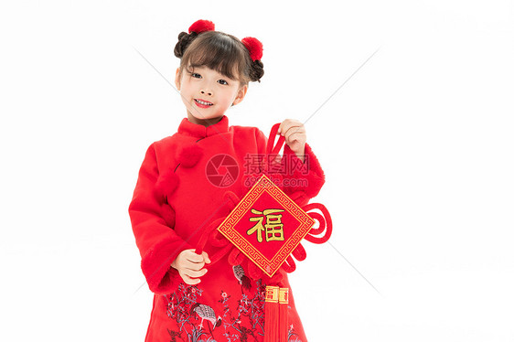 小女孩手拿新年饰品图片