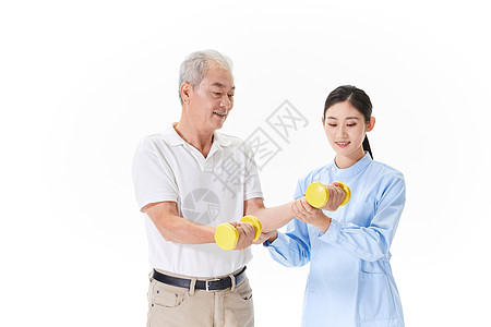 护工帮助老人做康复训练高清图片