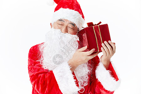 圣诞老人手拿礼物背景图片