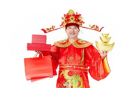 财神爷拿着礼物和金元宝图片