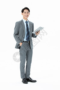 青年商务男性拿着平板办公图片