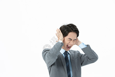 青年商务男性情绪爆发图片素材