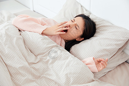 美女居家起床居家美女起床打哈欠背景