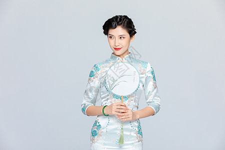 复古扇子中国风旗袍优雅美女拿扇子背景