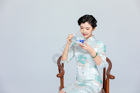 旗袍美女喝茶背景图片