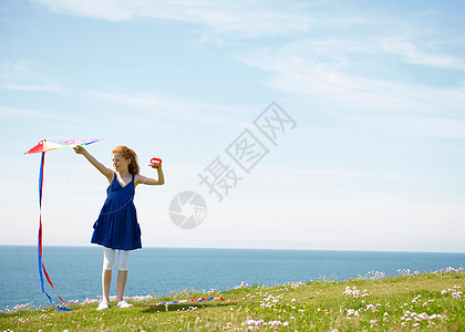 海边小女孩海边放风筝的小女孩背景