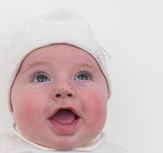 婴儿张开嘴微笑，特写镜头图片