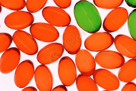 橙色和绿色药丸图片
