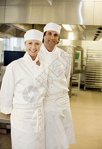 两位微笑的厨师背景图片