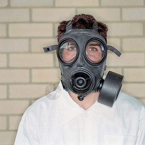 戴防毒面具的人背景图片