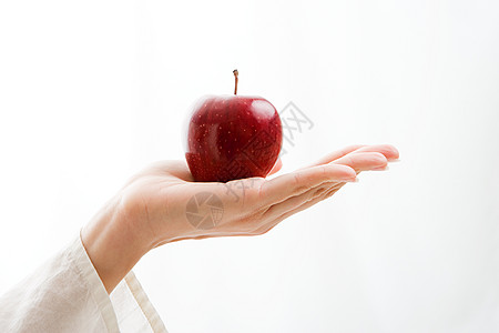 女子健身拿着苹果的女人背景