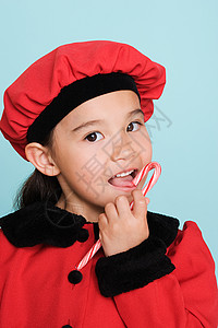 吃糖的女孩背景图片