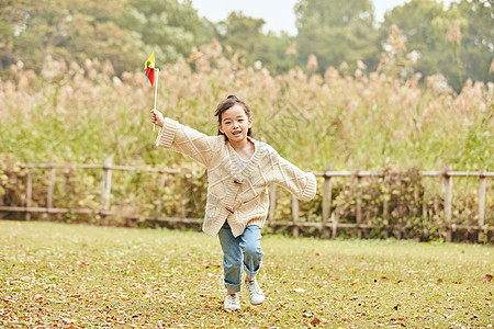 小风车小女孩玩风车背景