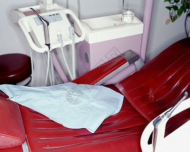 医院红色治疗椅背景图片