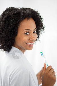 刷牙的女人背景图片