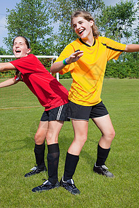 女足球运动员玩闹图片