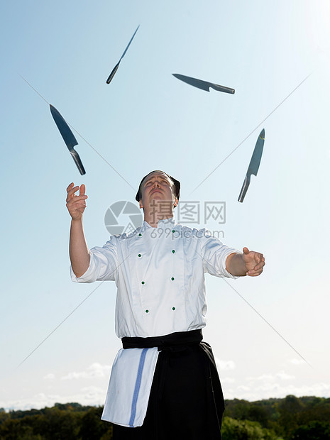 厨师用刀玩杂耍图片