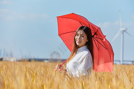 文艺美女手撑红伞图片