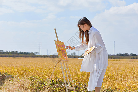 文艺清新美女户外油画写生图片