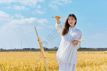 文艺清新美女户外油画写生图片