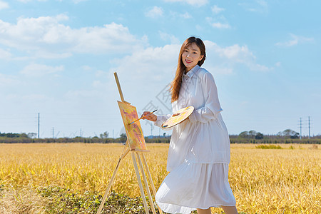 文艺清新美女户外油画写生图片