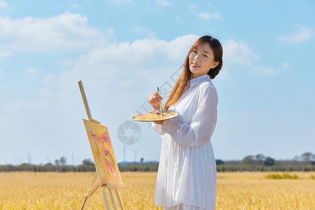 文艺清新美女户外油画写生图片