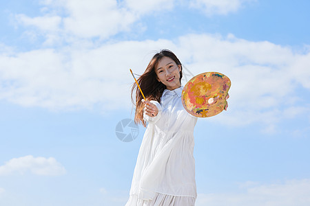 文艺清新美女户外油画写生图片