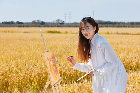 文艺清新美女户外油画写生图片