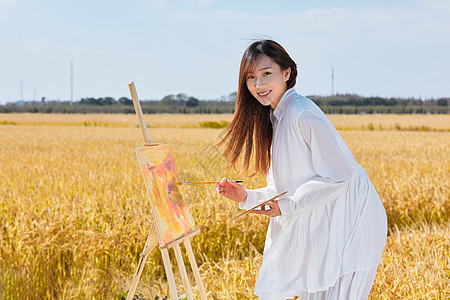 文艺清新美女户外油画写生图片