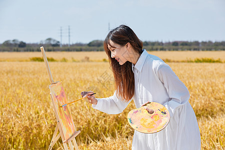 文艺清新美女户外油画写生图片