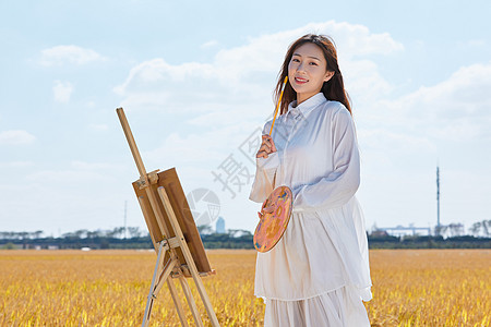 文艺清新美女户外油画写生图片