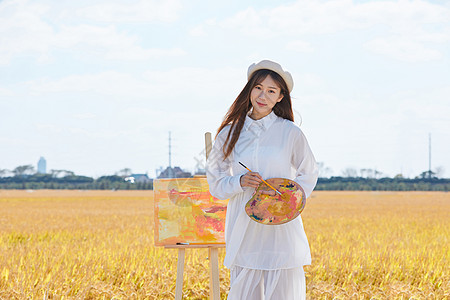 文艺清新美女户外油画写生图片