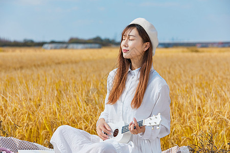 文艺清新女生弹尤克里里图片