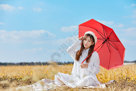 文艺美女手撑红色雨伞图片